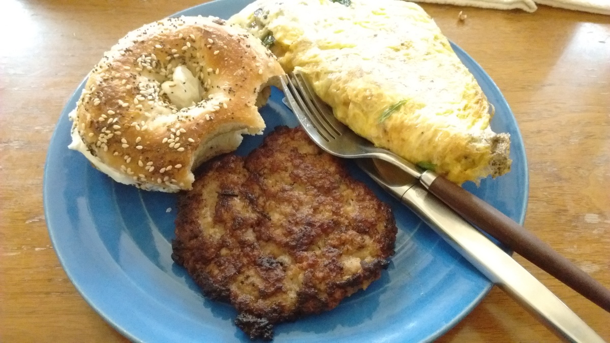 Mushroom omelet, chicken sausage, and everything bagel with cream cheese, from Beauty's Bagels in Oakland